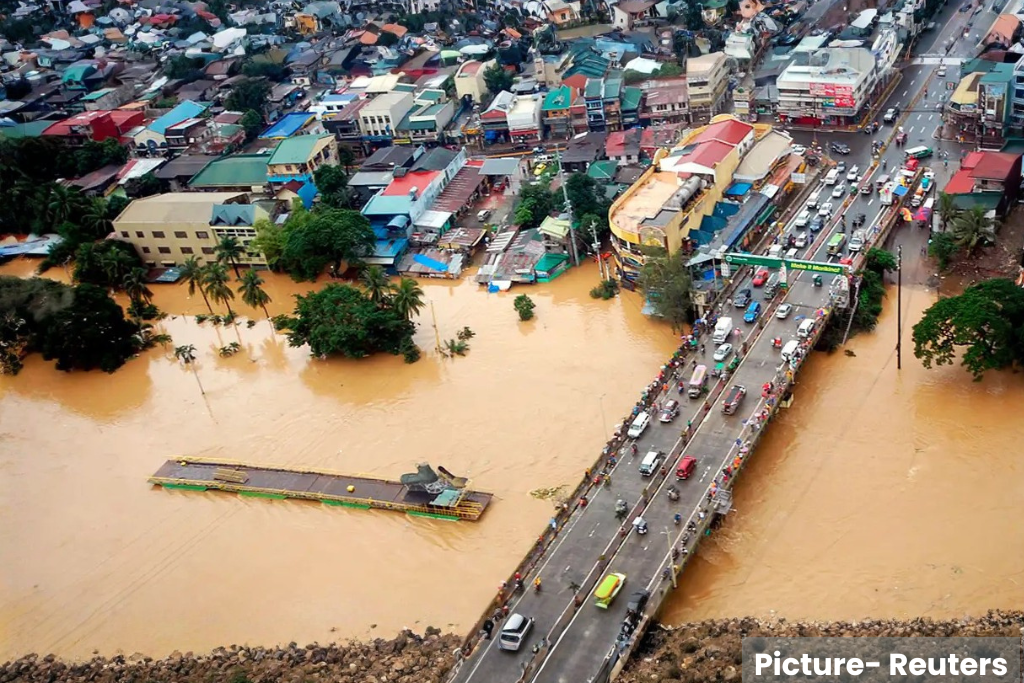 Typhoon Havoc: Cars Stack Up on Flooded Philippine Streets