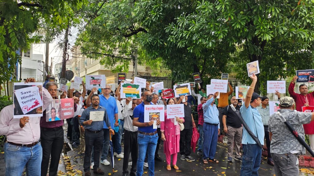 The Hindu community in Thailand organized a peaceful protest today in front of the Bangladesh Embassy in Bangkok, advocating for the safety and rights of Hindus in Bangladesh. The demonstration saw the participation of over 300 people who gathered to voice their concerns and call for an end to the atrocities against Hindus. The protest march began at 2:30 PM from Ekamai Soi 23 and concluded at the Embassy of Bangladesh on Ekamai Road. Participants carried placards bearing powerful messages such as "Save Humanity First: Stop the Atrocities!", "Hindu Life Matters: United for Peace and Dignity!", "Speak Up, Act Now: Hindu Life Matters!", "All Eyes on Hindus in Bangladesh," "Sacred Sites Matter: Safeguard Hindu Temples/Shrines," and "Respect Hindu Temples: Sanctuaries of Peace and Heritage." As the protest reached the embassy, the authorities permitted three representatives from the Vishva Hindu Parishad (VHP) Thailand to enter and hold discussions with the embassy head. The representatives, Susheel Shraff, Dinesh Pandey, and Jay Shankar, conveyed the concerns of the Hindu community to the embassy officials while the peaceful protesters awaited the outcome of the talks outside the gates. The protest was conducted in a calm and orderly manner, reflecting the community's commitment to peaceful advocacy. The Hindu community in Thailand remains united in its efforts to support the protection of Hindu lives and cultural heritage in Bangladesh. *About VHP Thailand:* The Vishva Hindu Parishad (VHP) Thailand is a socio-cultural organization dedicated to the preservation of Hindu values and culture. The organization actively engages in humanitarian efforts and advocates for the rights and dignity of Hindus worldwide.